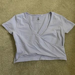 Cute wrap around crop top in purple, size M and the brand is ME to WE essentials